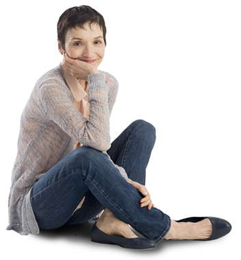 perimenopausal woman sitting on floor, crossed legs